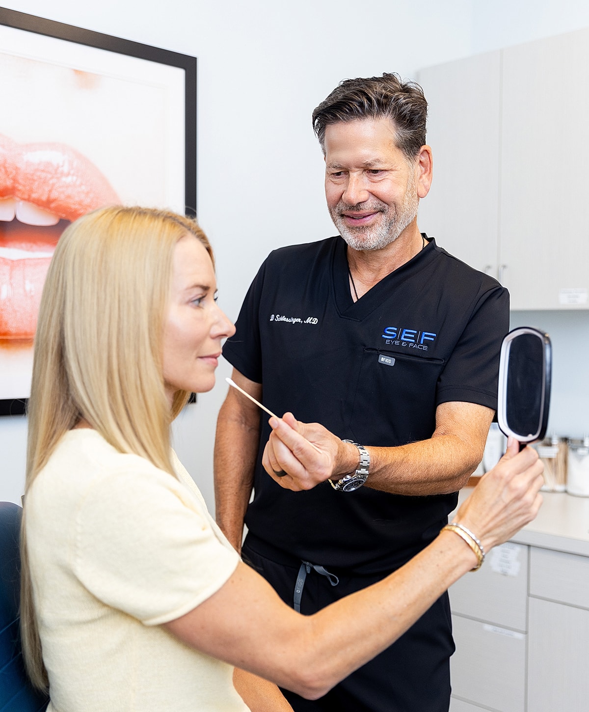 Patient consultation in aesthetic treatment setting.