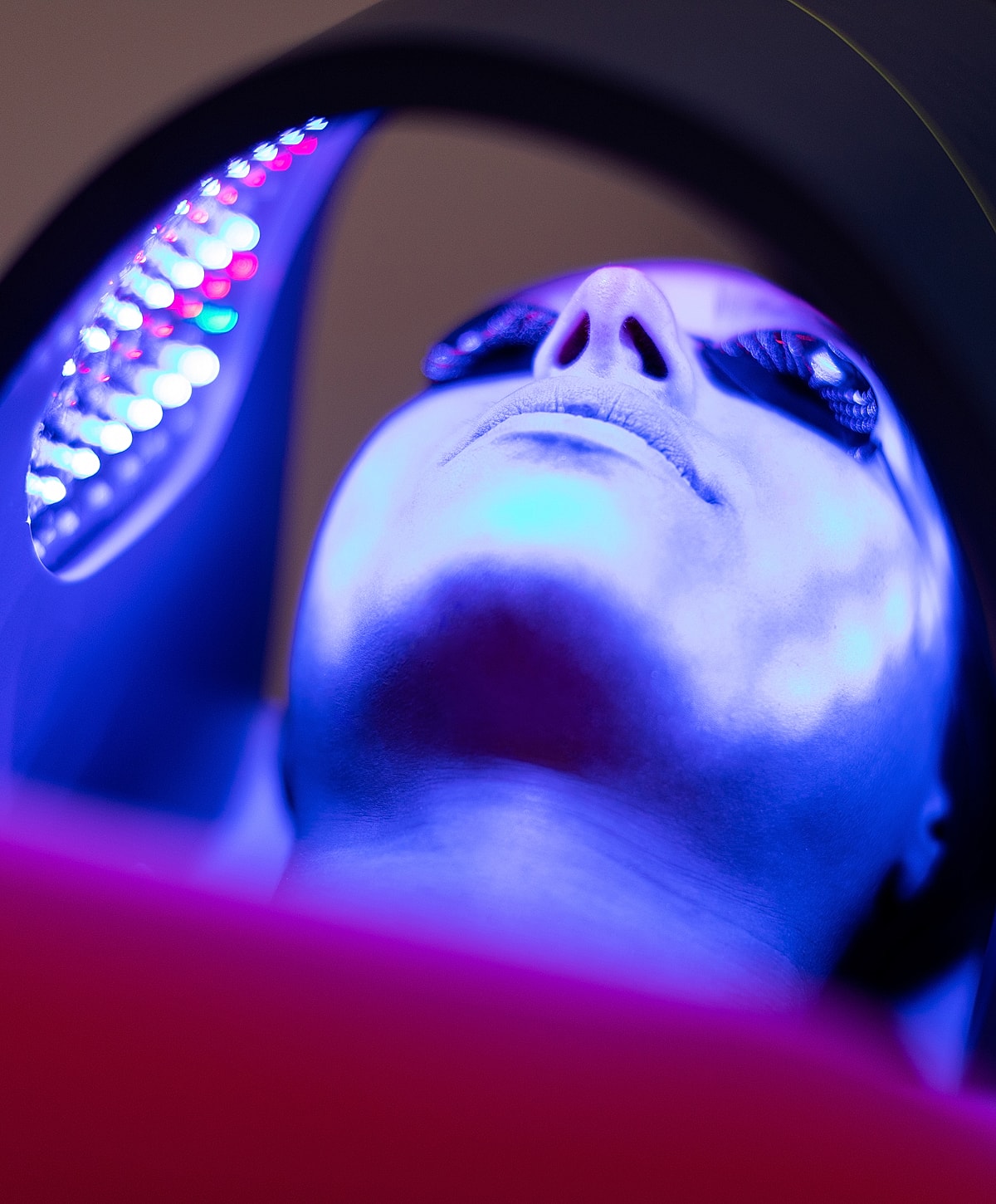 Person undergoing a light therapy treatment session.