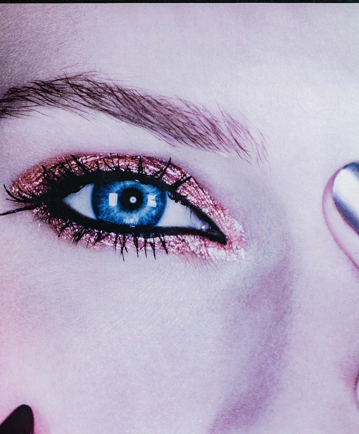 Close-up of an eye with dramatic makeup.