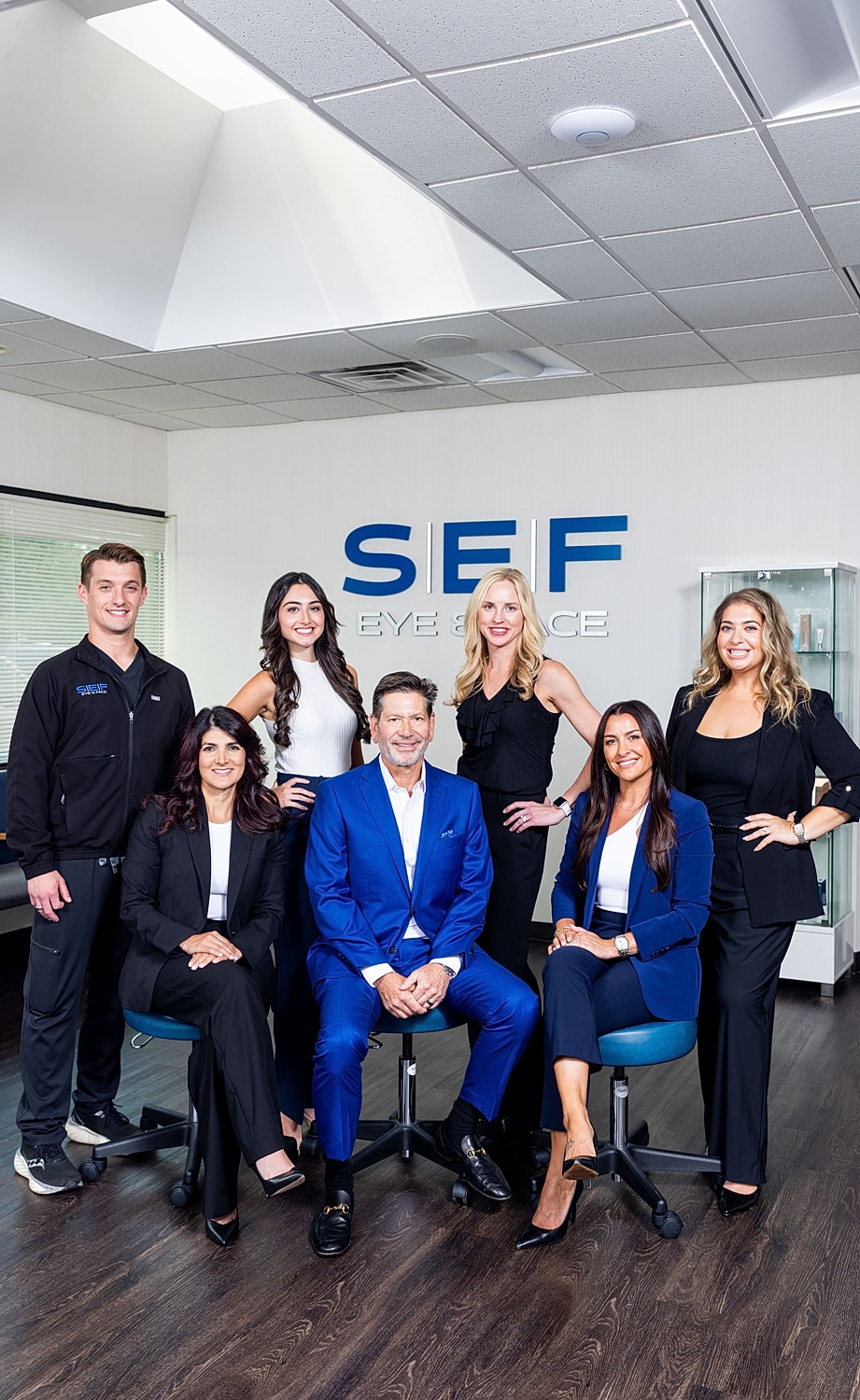 SEF Eye Space team posing in office setting.