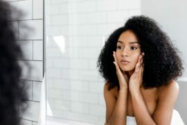 Woman looking at reflection